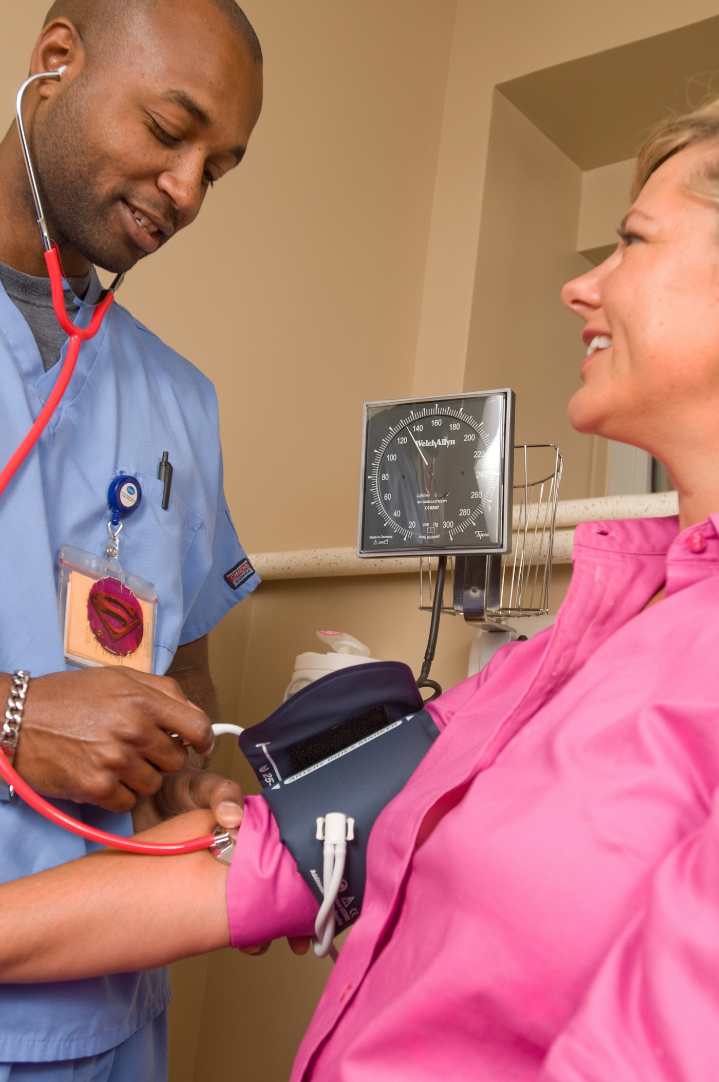 Checking blood pressure during a visit